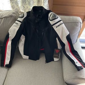 Dainese super speed tex jacket. Brand new with tags. Size 50. Includes gloves.